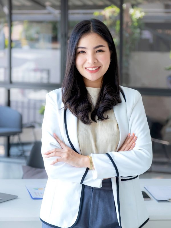Business woman joyful smiling bookkeeper's standing in the working office