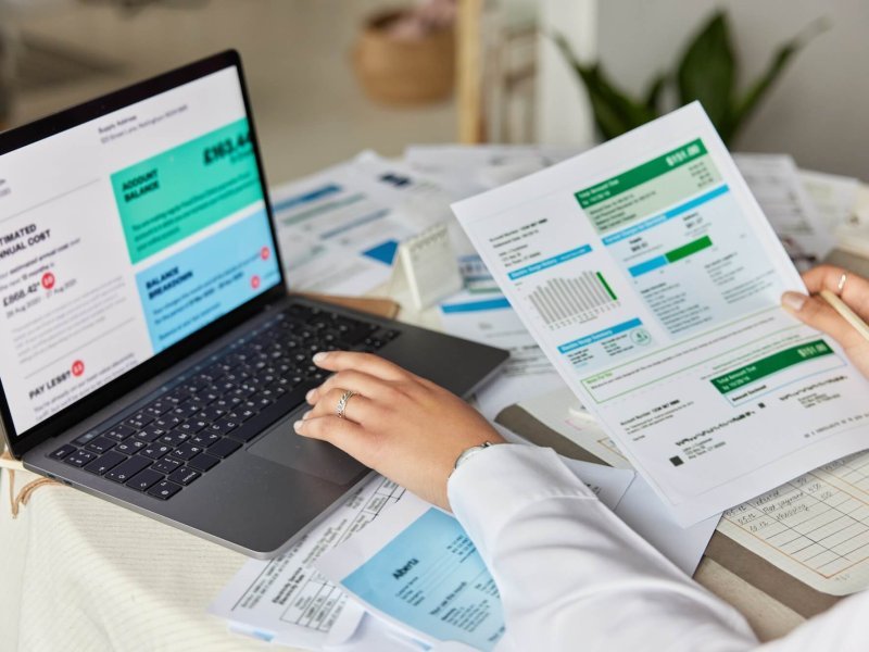 Cropped shot of unknown accountant and bookkeeper makes audit of expenses works with financial