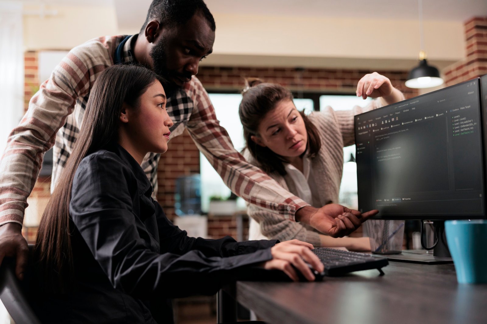 Cyber security agency multiethnic team encrypting mainframe database