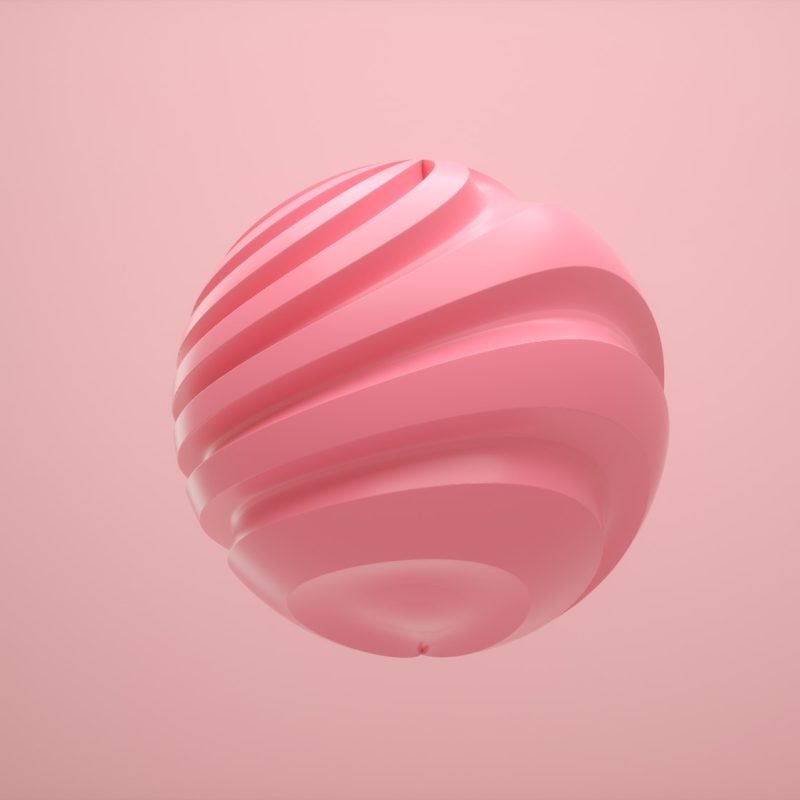 Pastel colored sphere with twisted lines on an isolated background. Minimalist design