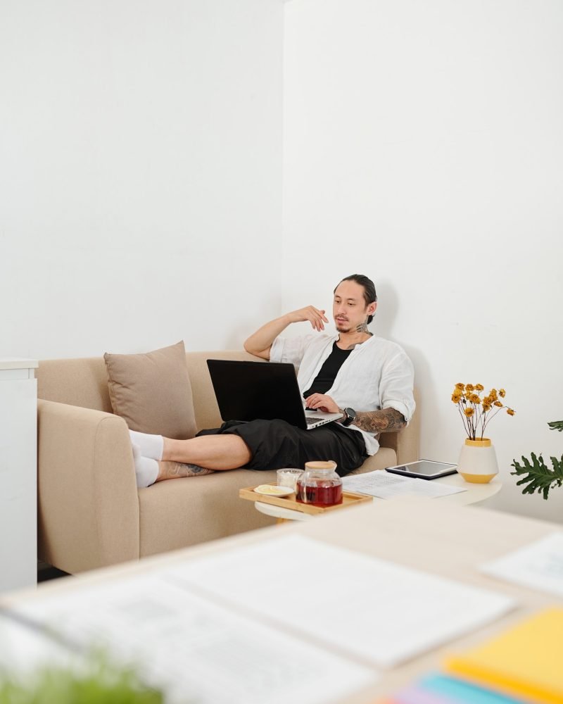 Man video calling creative team