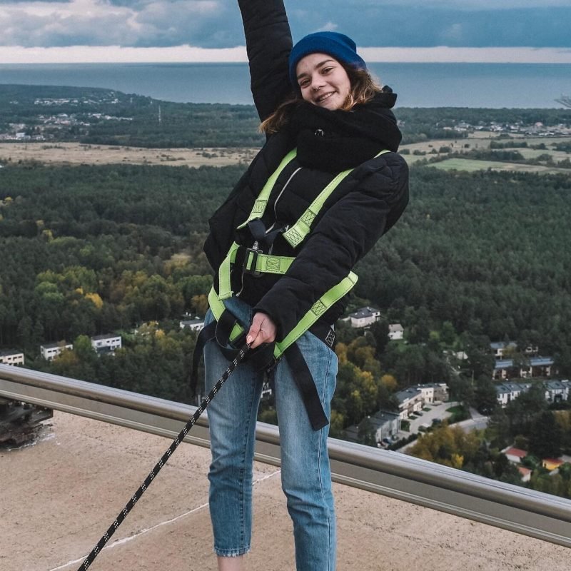 a-young-woman-walking-on-the-roof