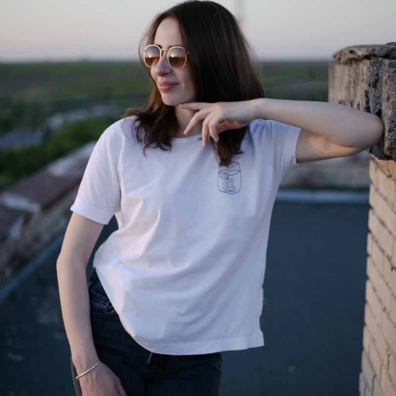 portrait of a young woman on the roof of the building