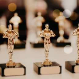 Oscar award. Prize for victory. Golden trophy,. Success concept. Horizontal shot