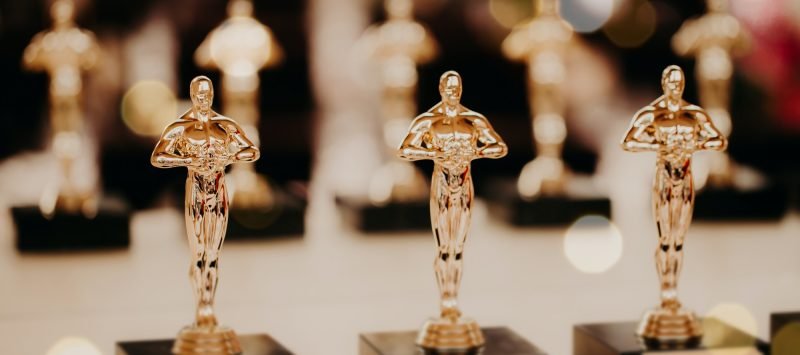 Oscar award. Prize for victory. Golden trophy,. Success concept. Horizontal shot