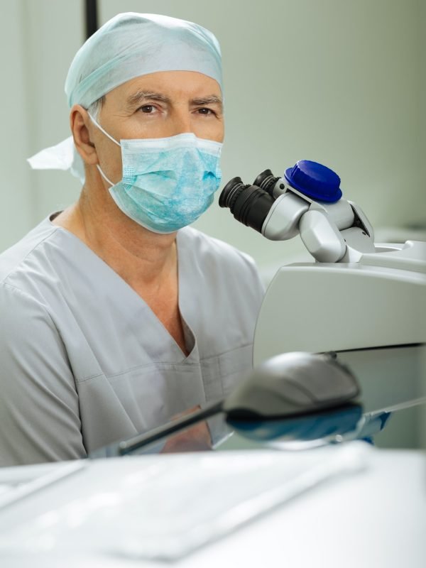 Smart experienced ophthalmologist being ready to work