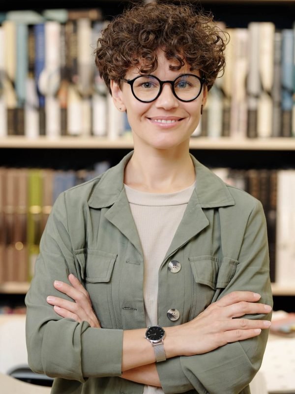 young-smiling-confident-female-shop-assistant-or-manager-of-interior-design