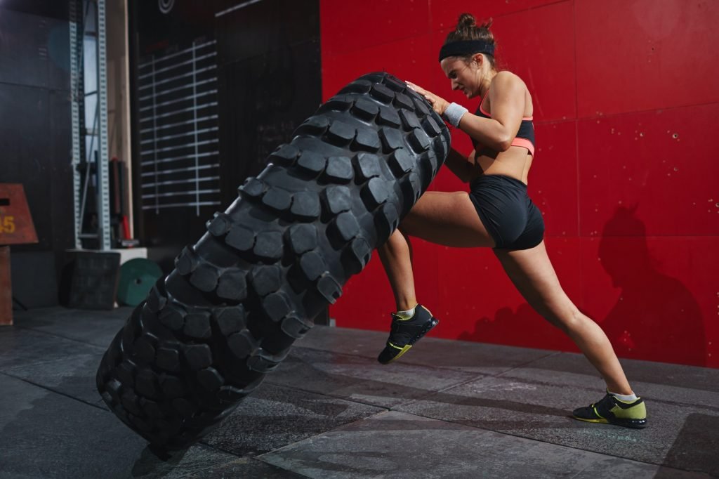 Flipping tyre in gym