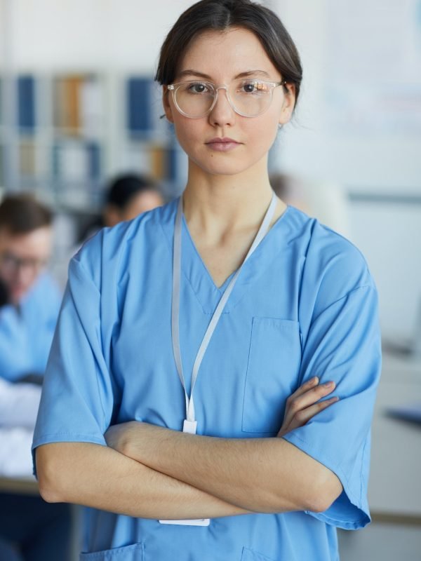 Portrait of Nurse Posing in Clinic