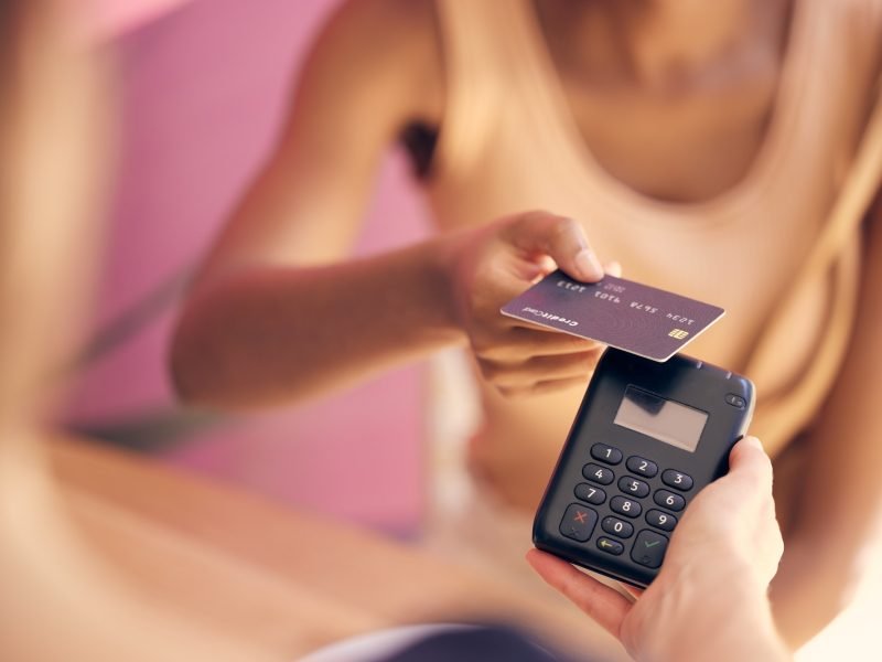 Credit card, retail customer and rfid payment at cashier, store service and point of sale machine.