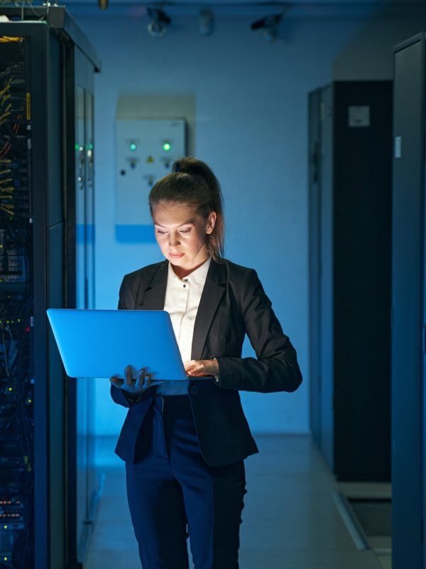 IT engineer specialist working in network server room
