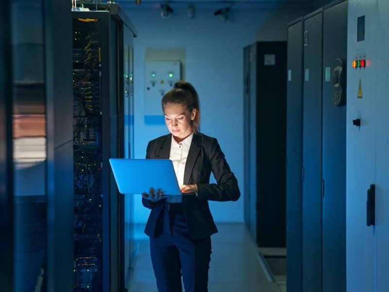 IT engineer specialist working in network server room