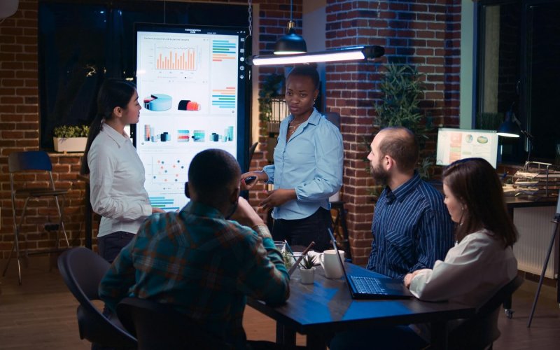 Diverse women coaching company team in business meeting Diverse women coaching company team in business meeting